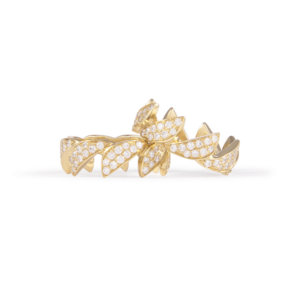A Vice Versa yellow gold leaf ring with Versa Ring Diamond pavé band.