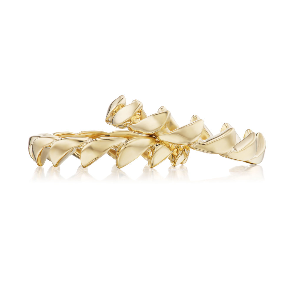 A pair of Vice Versa 14k yellow gold-plated band rings.