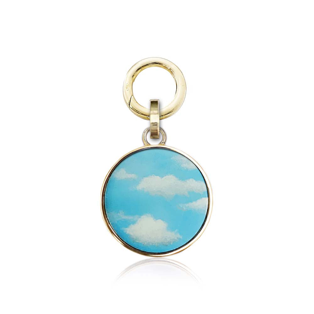An Anna Maccieri Rossi Art Dreamy Charm featuring a blue-sky design with clouds.