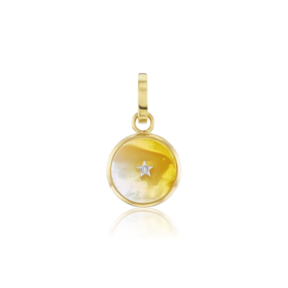 An orange Mother of Pearl round charm pendant with a star, adorned with an Anna Maccieri Rossi accent.