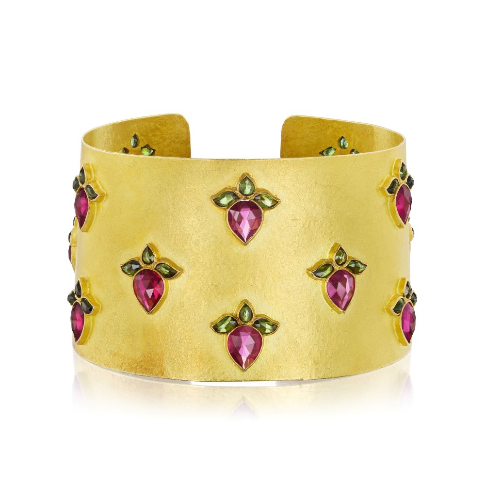 A Lotus Cuff Bracelet crafted in yellow gold, adorned with pink and green tourmaline stones, Munnu.