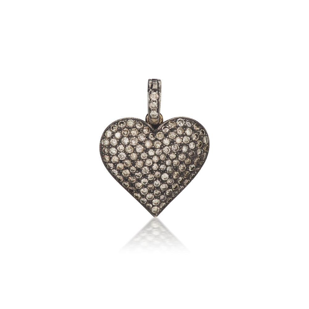 A Munnu Diamond Heart Charm with white diamonds.
