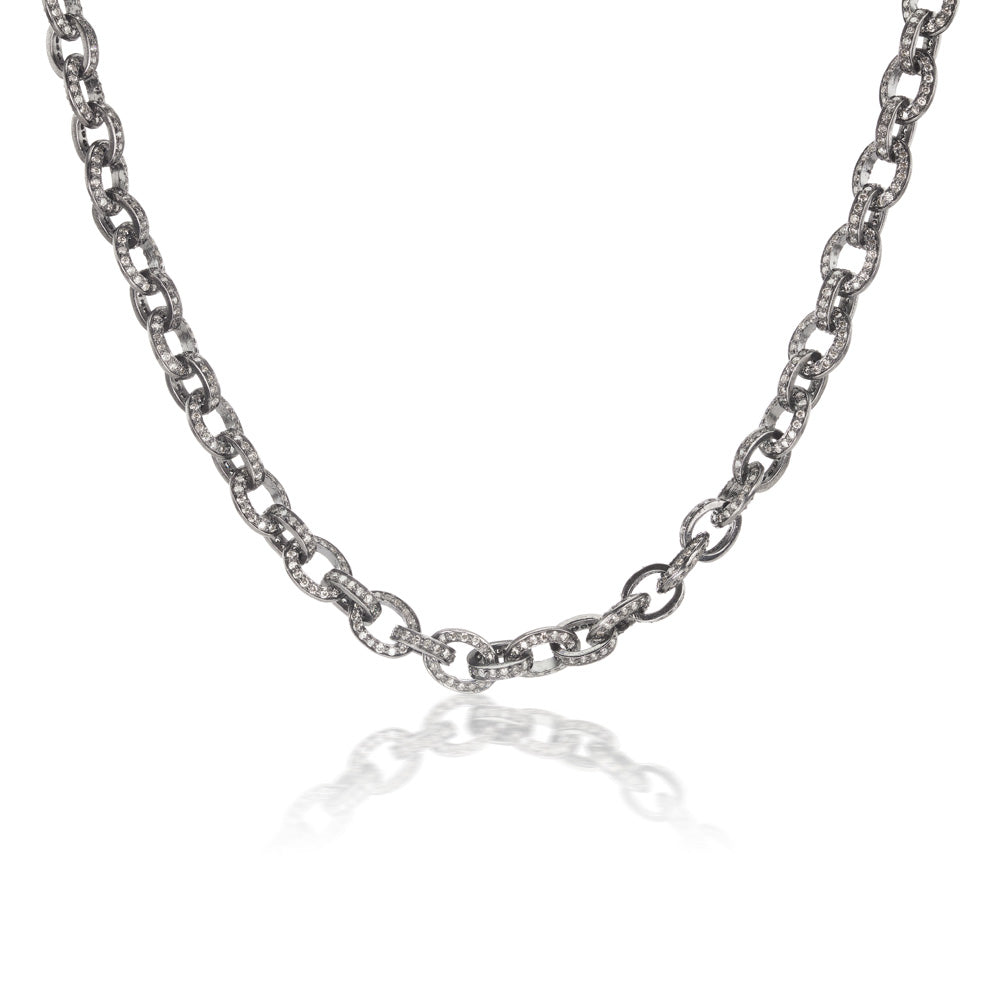 An Indo-Russian silver chain necklace with flat oval link chain, adorned with diamonds by Munnu.