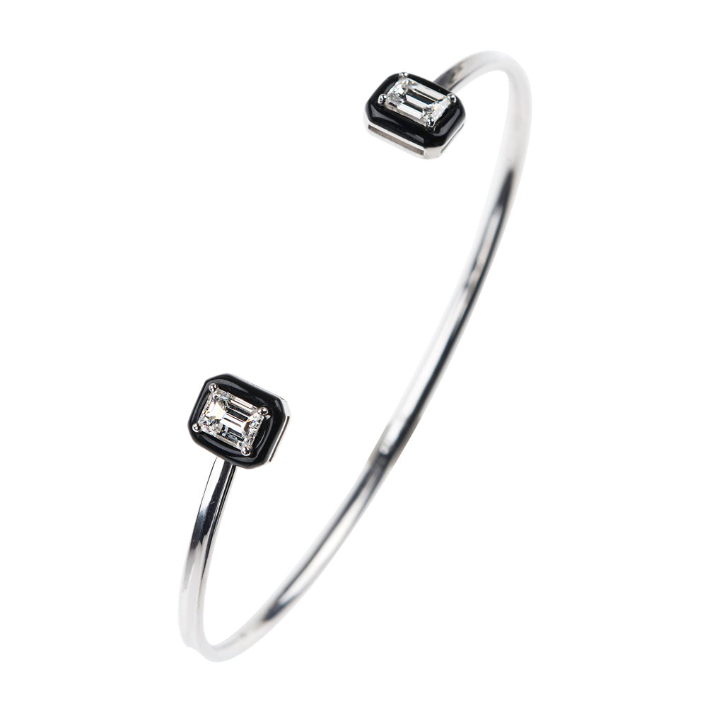 A Nikos Koulis Oui Bracelet With White Diamonds and Black Enamel.