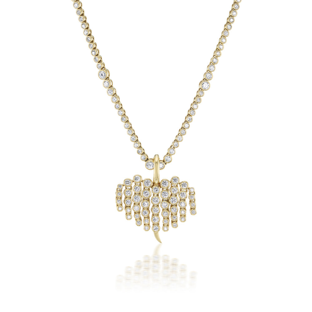 An Ondyn Diamond Fringe Charm necklace adorned with exquisite diamonds.