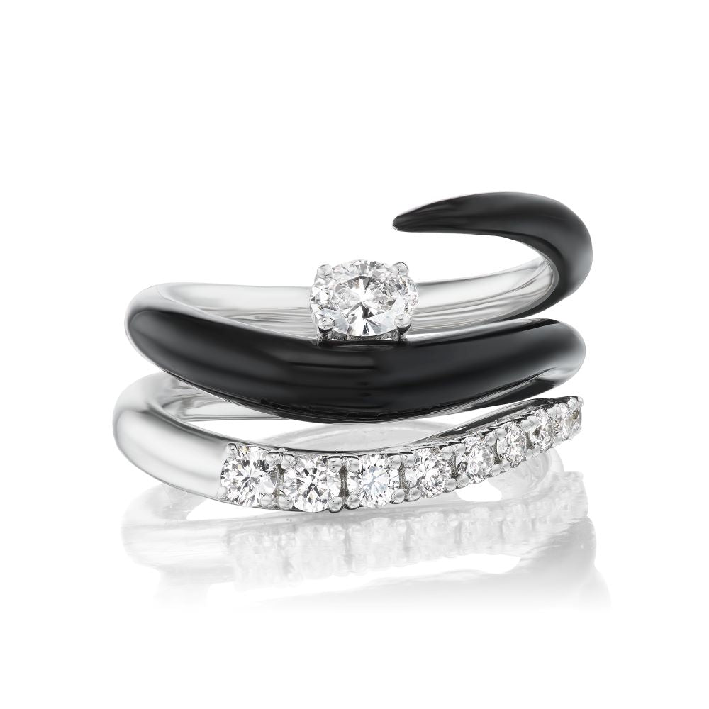 A black and white Oui Diamond Enamel Ring set in white gold by Nikos Koulis.