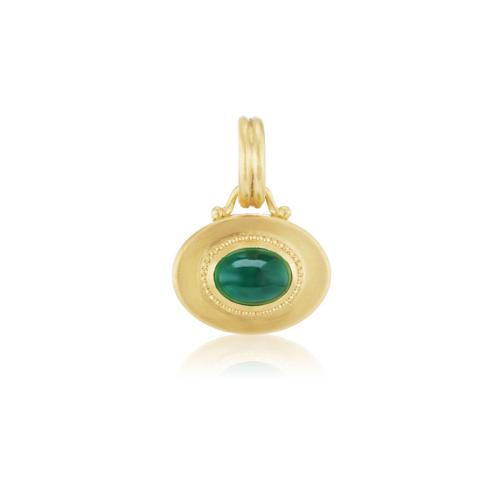 A Prounis Granulated Heart Charm pendant with an oval emerald stone.