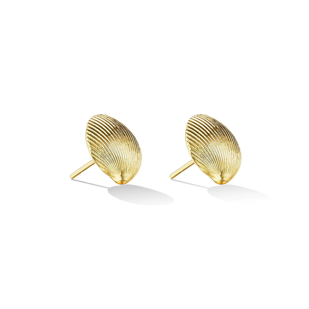 A pair of small Cadar wavy, yellow gold shell stud earrings.