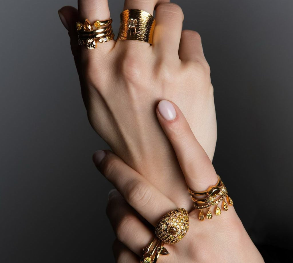 Colored Diamond Pear Cut Ring in Yellow Gold