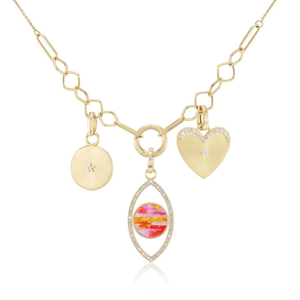 Anna Maccieri Rossi Mother of Pearl Vertical Eye Charm necklace with a pink heart and two gold charms.