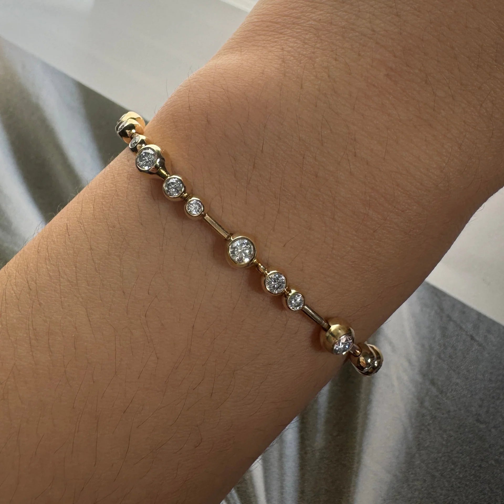 White Diamond Ripple Bracelet in Yellow Gold