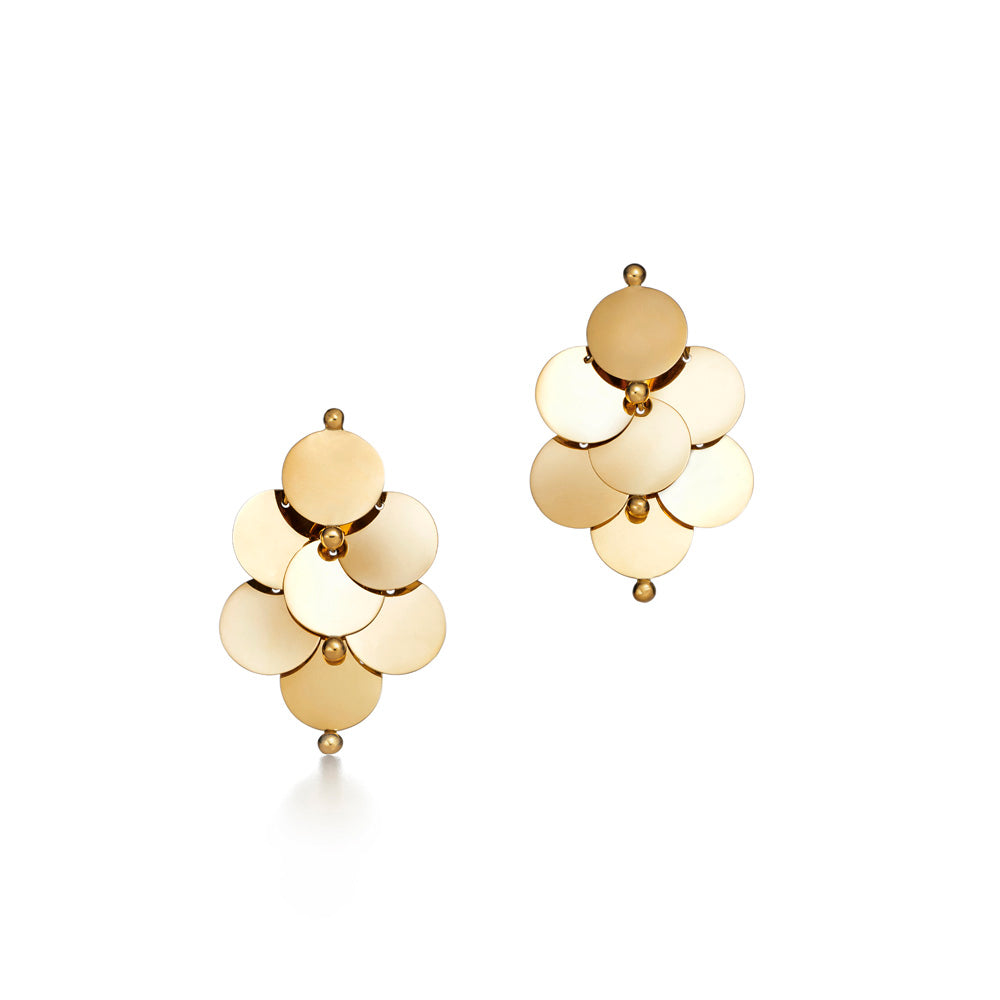 A pair of Dancing Disc Earrings by Futura, yellow gold-plated hoop earrings.