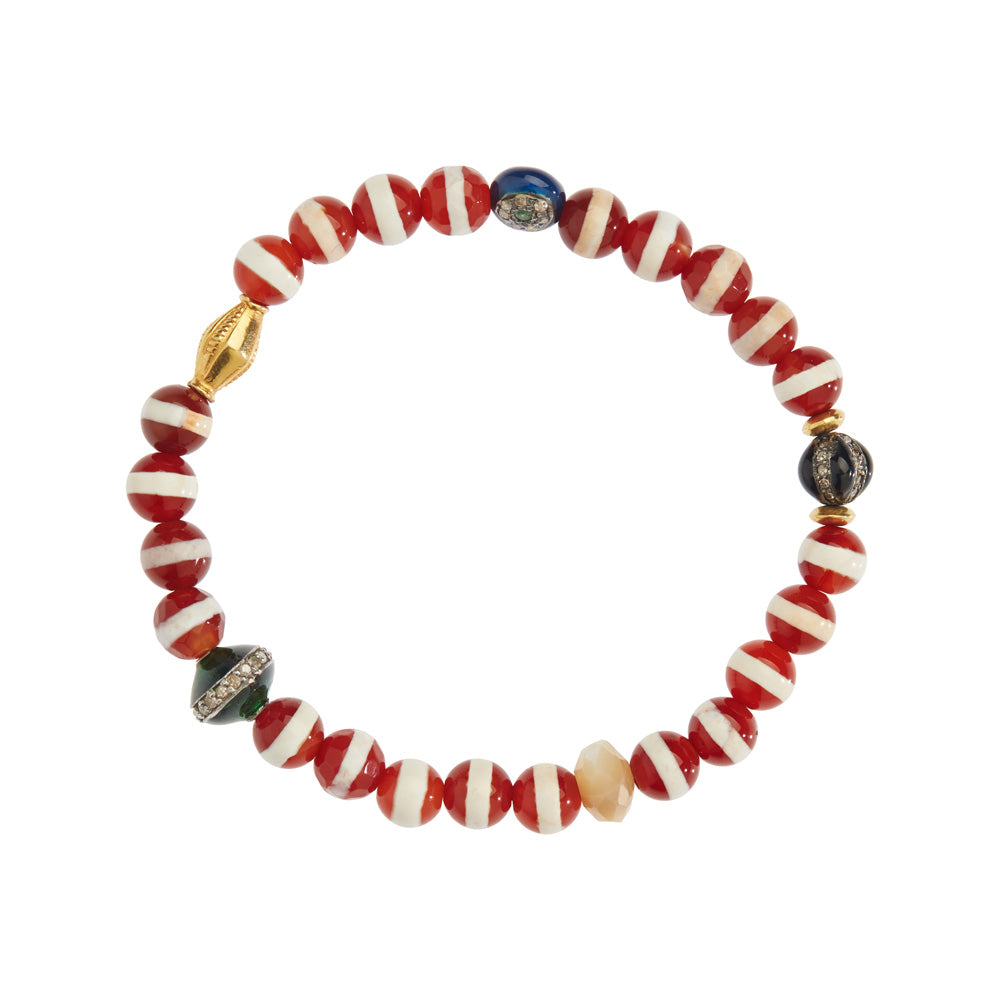 An Ileana Makari red agate beaded bracelet adorned with Tibetan agate beads, including one exquisite gold bead.