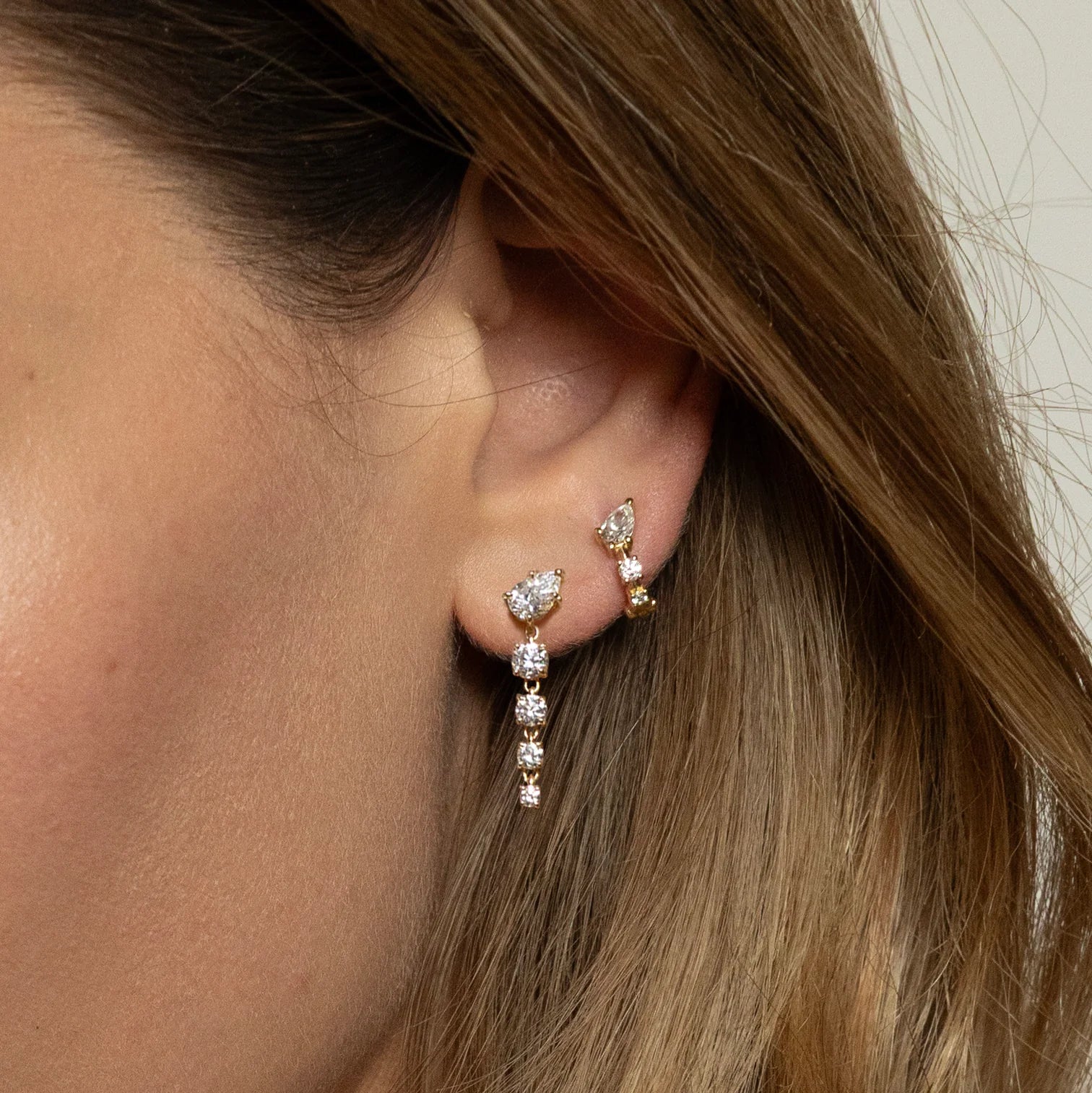 White Diamond Bias Drop Earrings in Yellow Gold