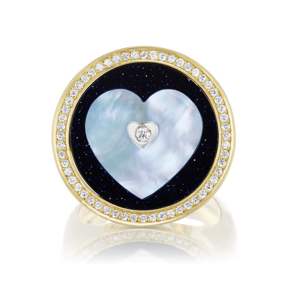 An Ora Midnight in Love Ring by Anna Maccieri Rossi, heart shaped, yellow gold ring adorned with diamonds and mother of pearl.