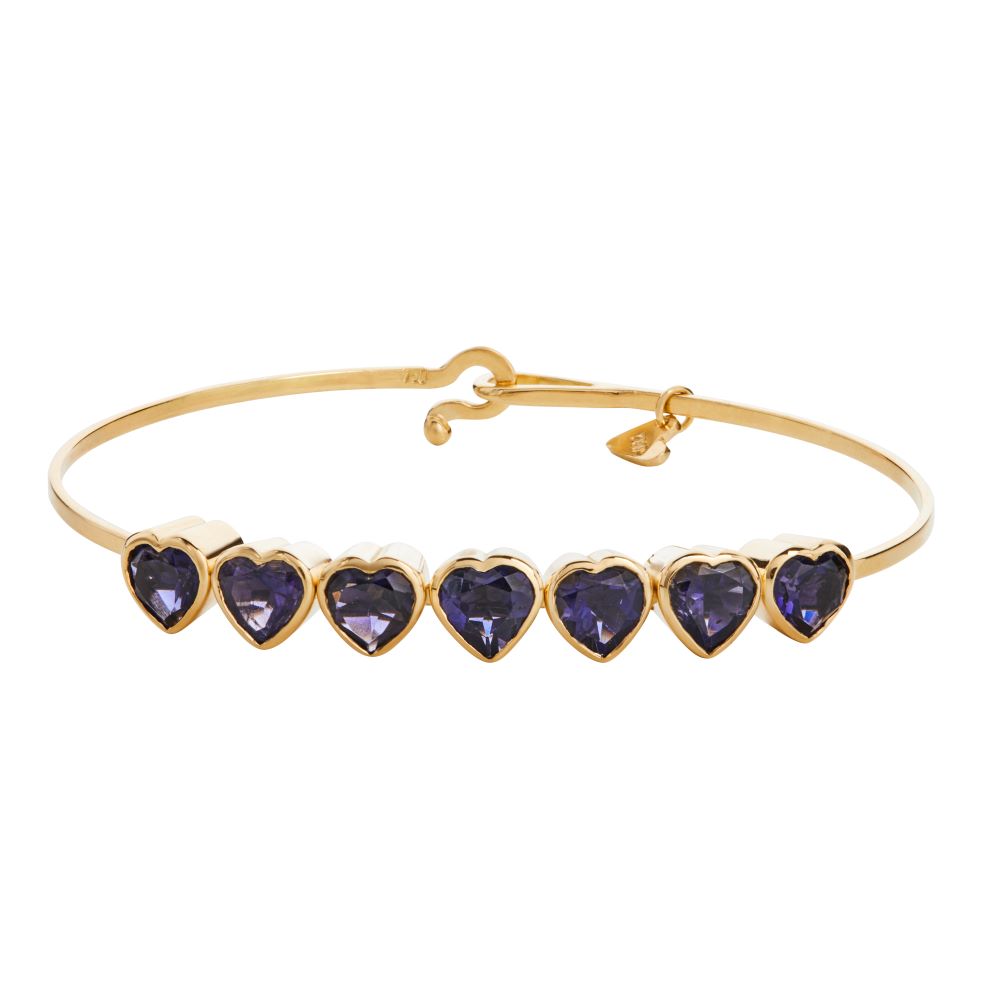 A Christina Alexiou 7 Heart Bracelet with purple stones.