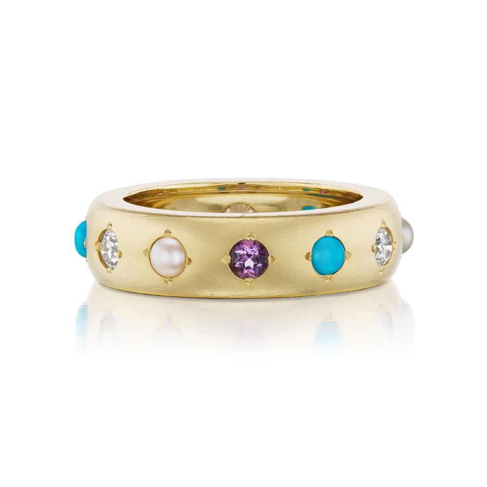 A Jenna Blake Gypsy Ring with inlaid circle cut turquoise and diamond stones.