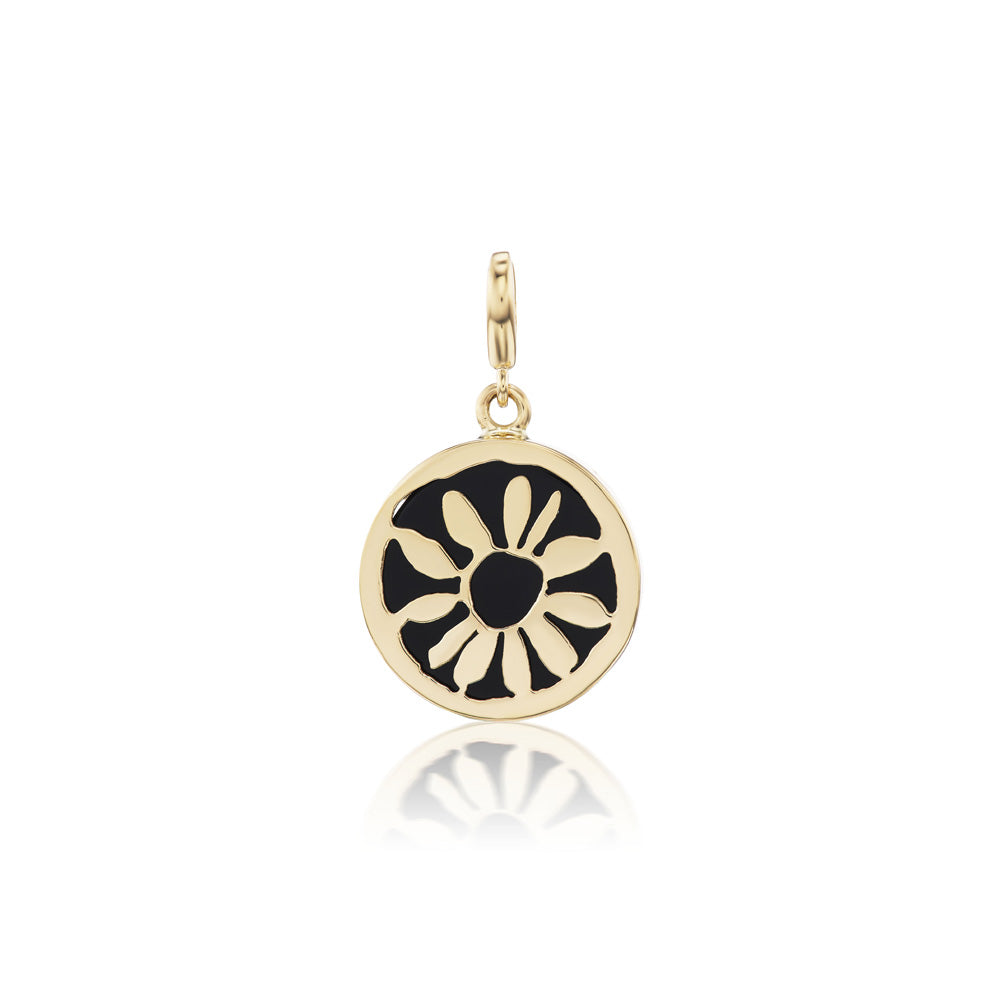 A black and gold Luis Morais Flower Medallion Charm on a white background.