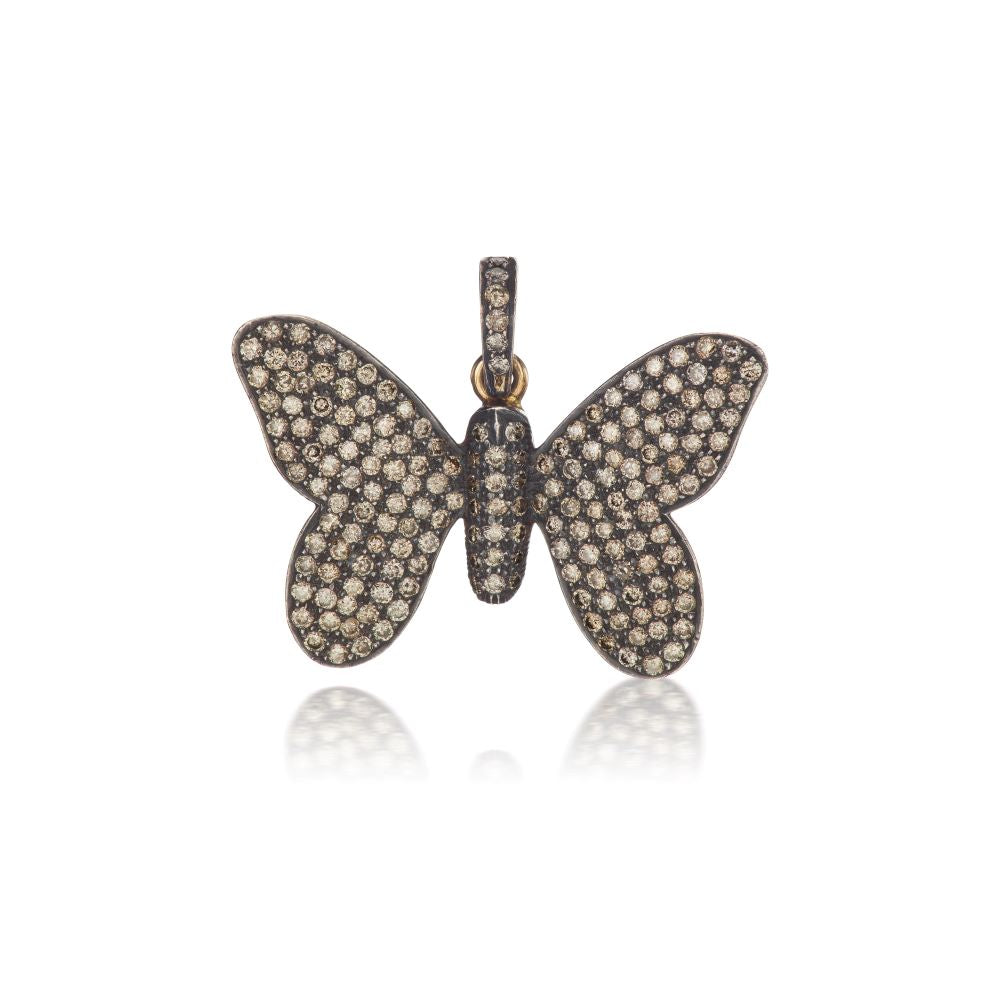A Munnu Diamond Butterfly Charm adorned with diamonds against a white background.