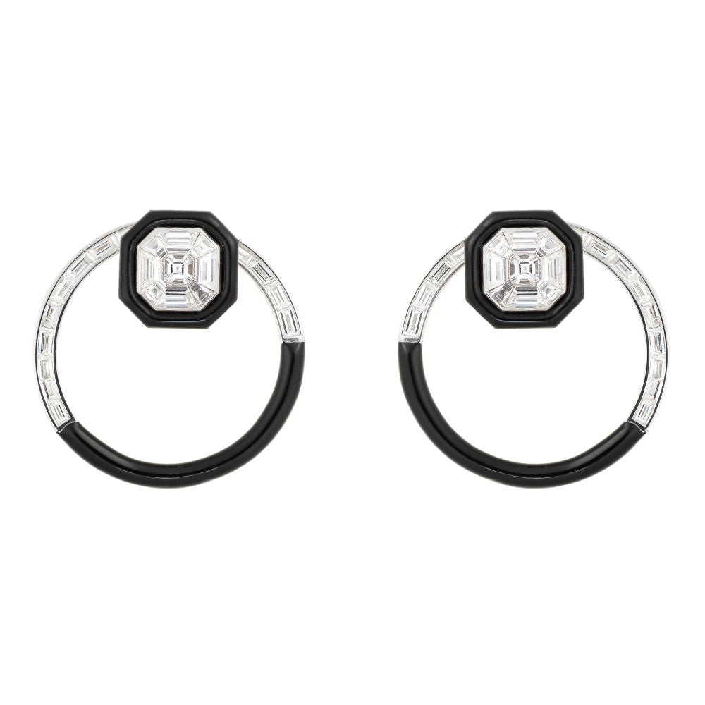 A pair of Nikos Koulis Oui Earrings with white diamonds and black enamel.