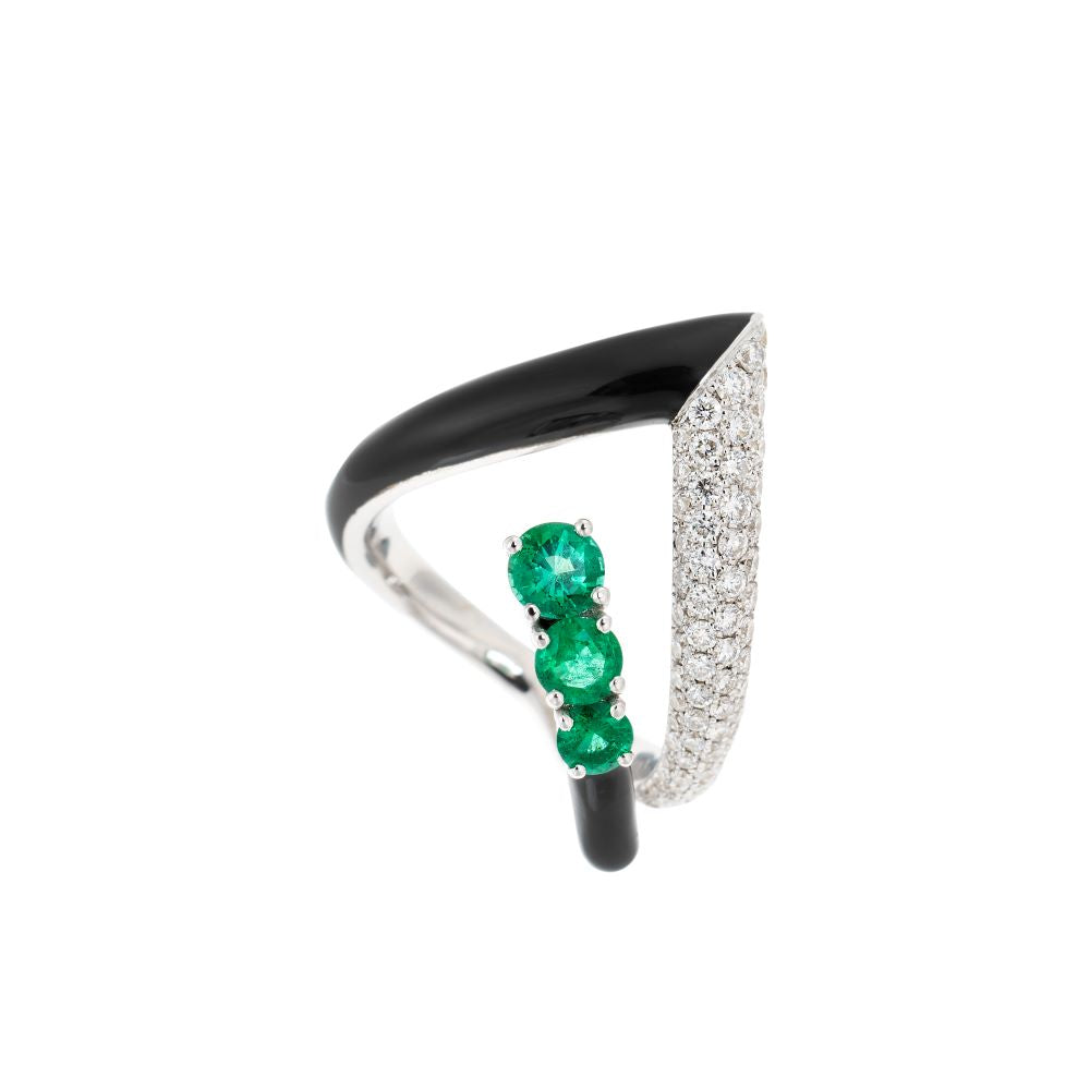 A stunning Nikos Koulis Oui ring adorned with radiant emeralds and sparkling white diamonds.