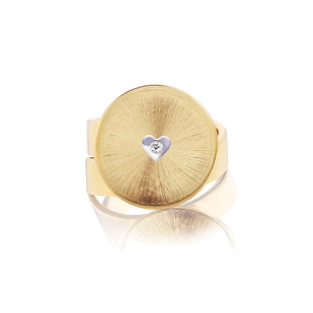 An Anna Maccieri Rossi Gold Mini Adjustable Signet Ring with a diamond in the center.