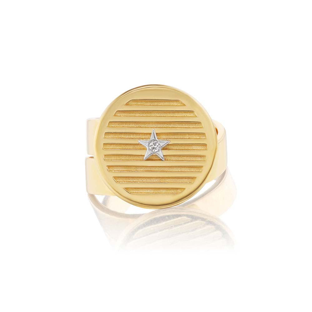 A yellow gold ring with a diamond in the center, featuring a star. The product is the Striped Gold Adjustable Ring from Anna Maccieri Rossi brand.