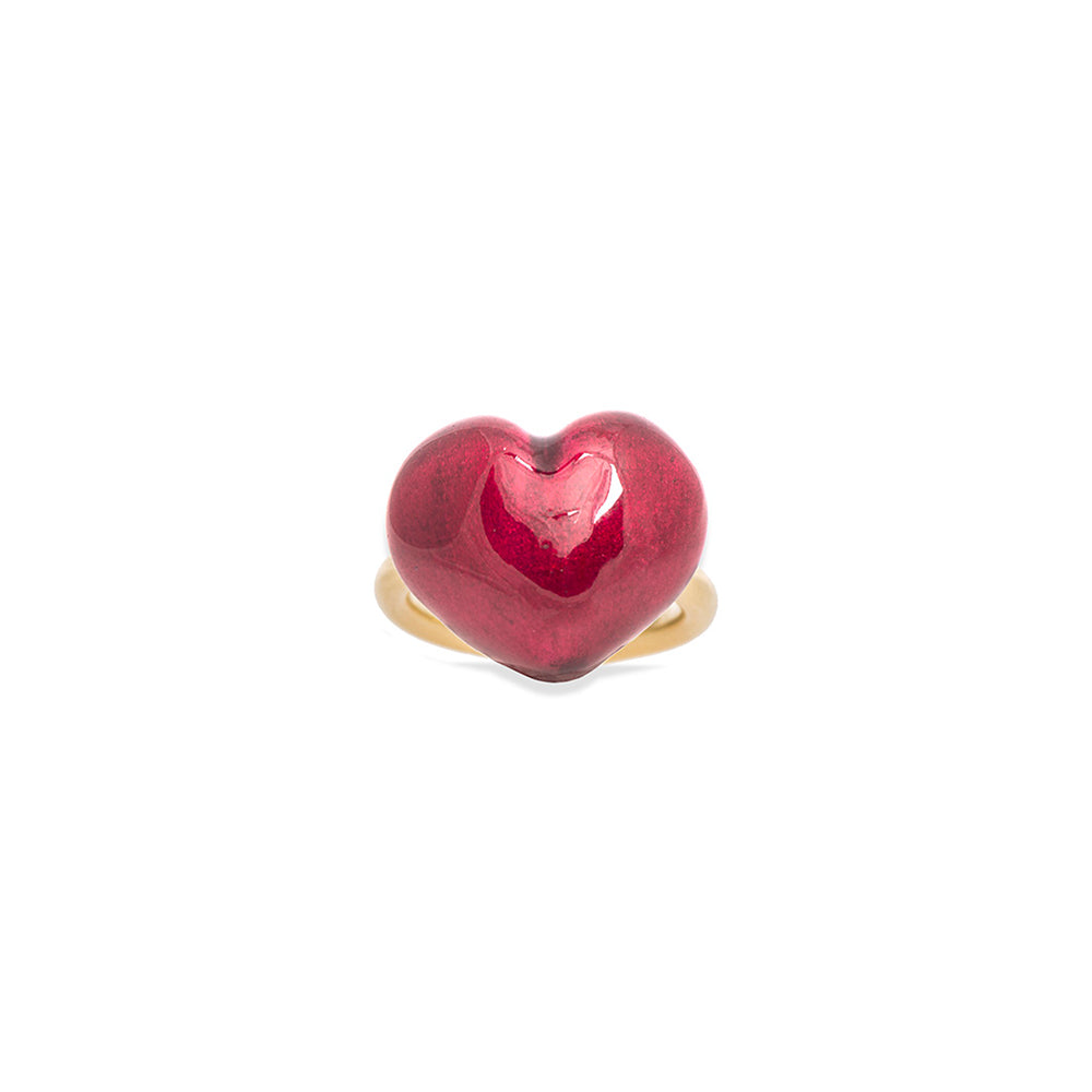 A Puffy Heart Ring made by Christina Alexiou of yellow gold on a white background.