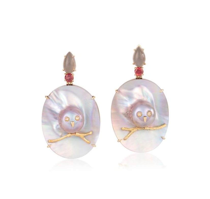 Carved Mother-of-pearl owl earrings with garnets in yellow gold