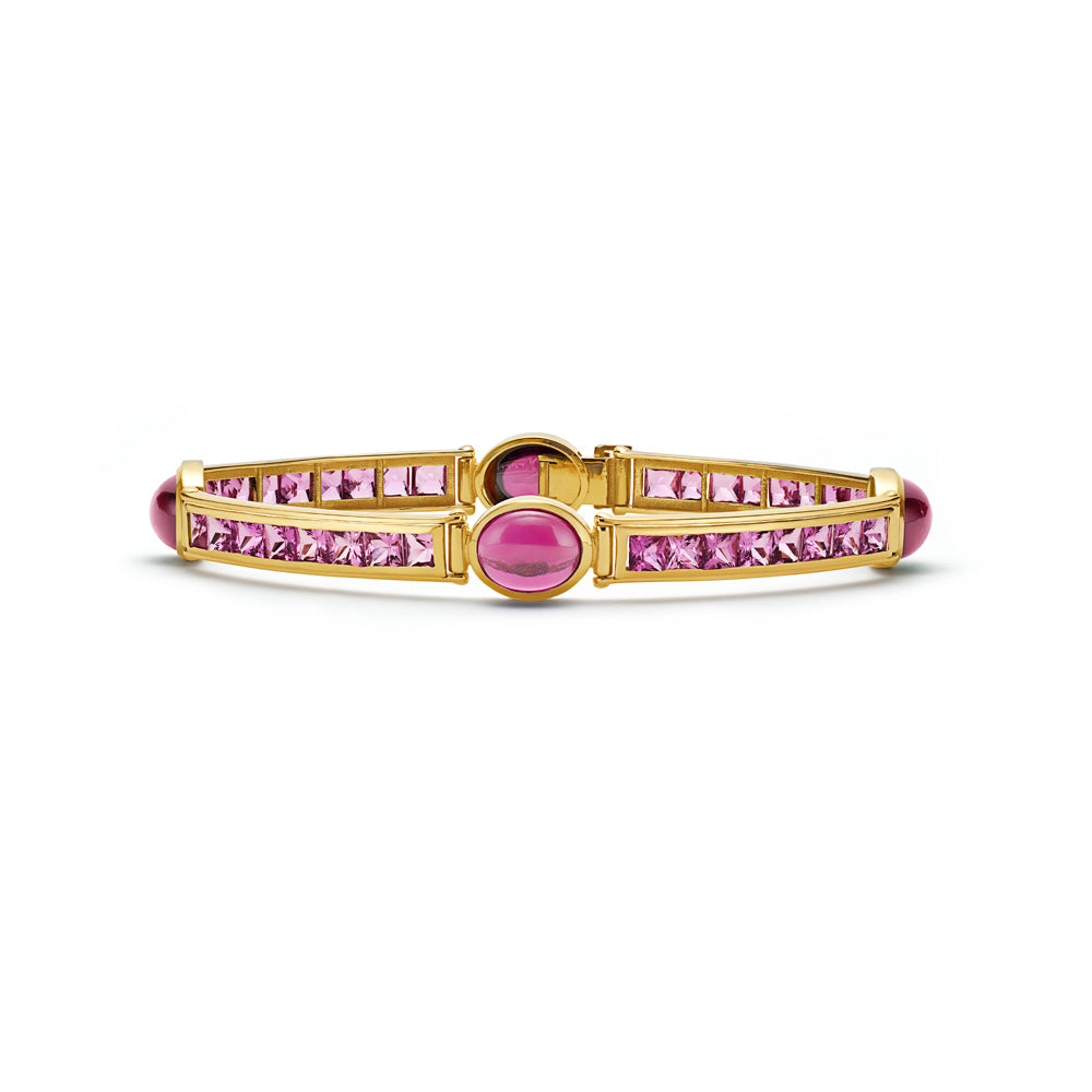 A VAN yellow gold Stack Bracelet adorned with pink sapphires and diamonds, perfect for stacking.