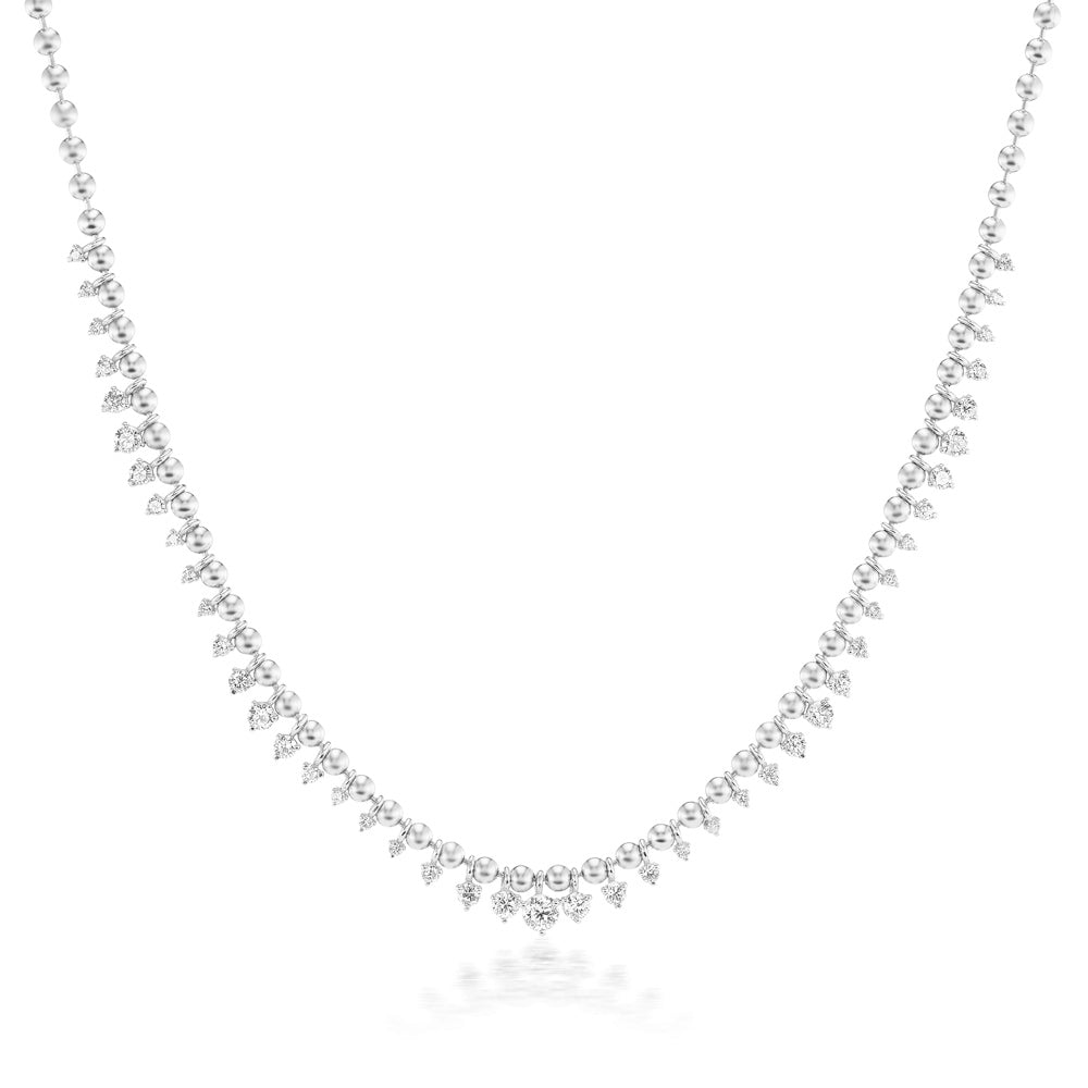 A Vice Versa Kin Necklace adorned with diamonds.